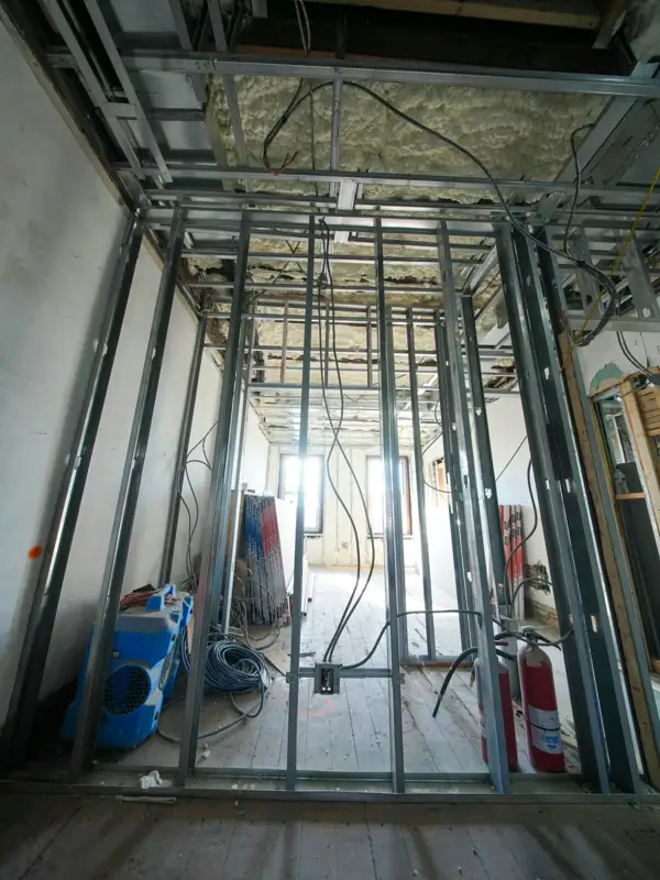 Metal stud framing and insulation inside a renovation