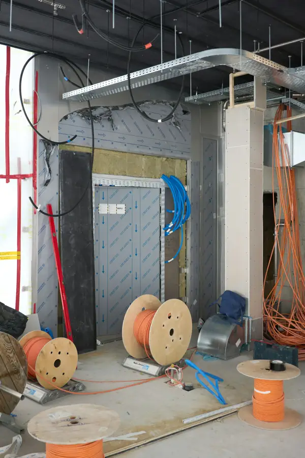 Mineral wool insulation boards installed in a wall assembly