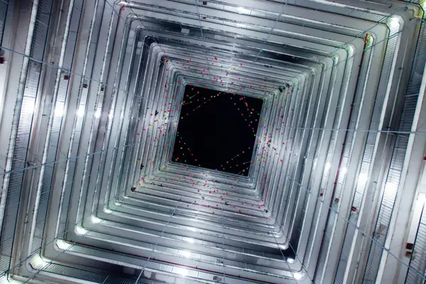 Inside view looking down a large rectangular metal air duct
