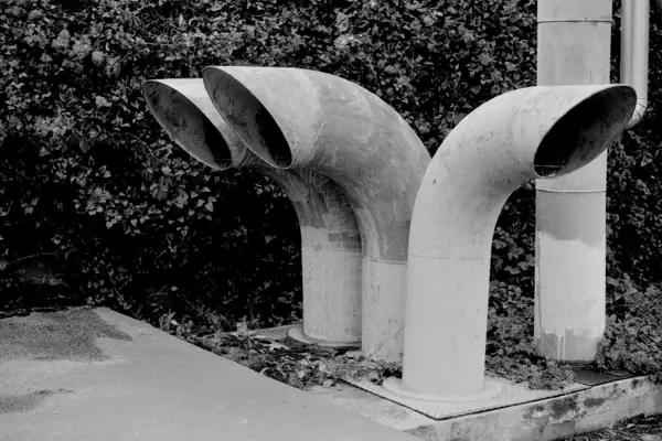 Outdoor ventilation intake and exhaust pipes