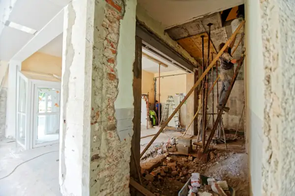 Old wall opened up to expose framing during a renovation