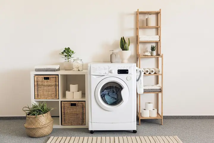 Front-load washer in a bright laundry area